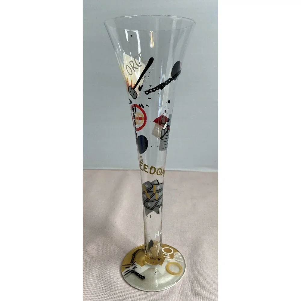 LOLITA - DIVORCE CHAMPAGNE FLUTE GLASS HAND PAINTED. SOME PAINT WEAR ON GLASS.